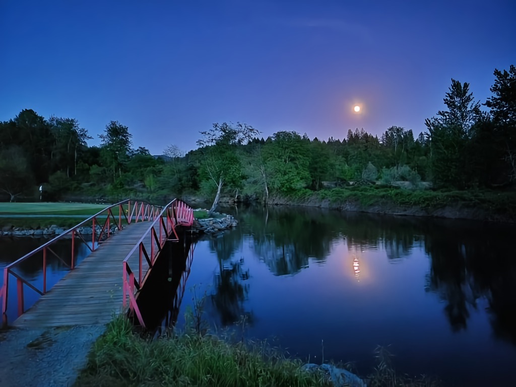 full moon over Applegate River Golf & RV's 8th hole water and bridge feature